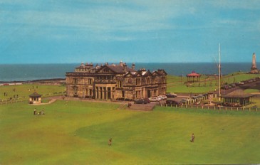 Featured is a postcard image of The Royal and Ancient Club House and 18th green at St. Andrews Golf Course - the Golfer's ultimate dream vacation destination.  The original unused c 1950s postcard is for sale in The unltd.com Store.
